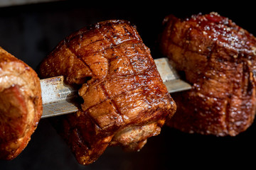 Pork belly grilled and barbecue on a charcoal grill. 
