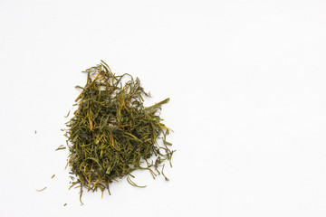 A handful of dried dill on a white background