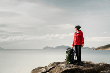 Woman exploring the coast