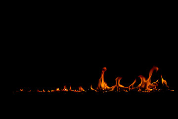 On fire flames at the black background