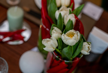 horizontal photo close-up of a bouquet of white tulips