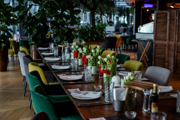 horizontal photo of a beautifully set dining table