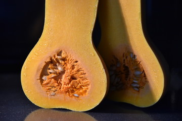 Sliced, fresh organic pumpkin with seeds. 