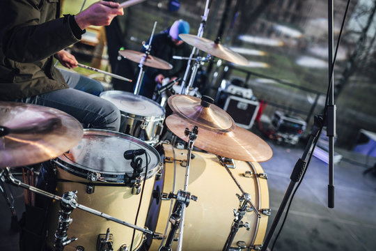 Drumset in close up view on stage, drummer playing set on stage