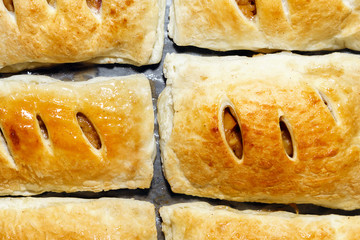 Appetizers with puff pastry with various fillings with apples top view, close-up
