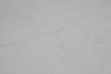 Obraz premium Abstract gray cement or concrete cracks wall texture background.