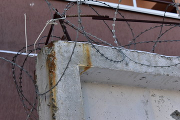 Barbed wire on the fence of a prison or closed area