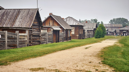 Fototapeta na wymiar Old russian wooden houses in Shushenskoe village