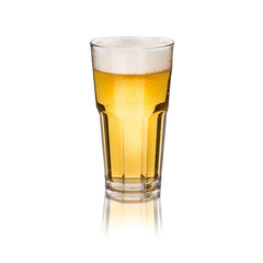 Glass of light beer with foam isolated on white background.