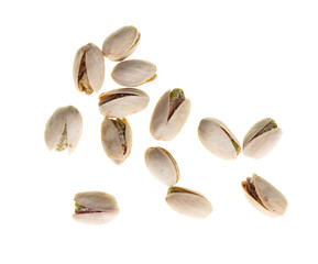 Ripe pistachios nuts isolated on a white background
