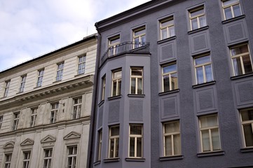 Fototapeta na wymiar Old grey building in the town (Prague, Czech Republic, Europe)