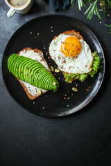 Fototapeta na wymiar avocado sandwich (healthy snack) menu concept. food background. top view. copy space