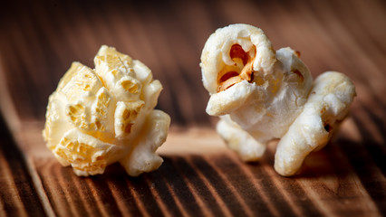 Popcorn flakes on a wooden background