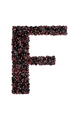 Letter F of the English alphabet of freshly roasted cocoa beans on a white isolated background. coffee pattern made from coffee beans
