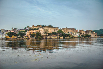 Udaipur, Rajasthan / India »; August 2016: The royal palace from the lake of the city of Udaipur