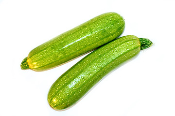 green zucchini on a white background