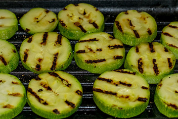 Spicy hot grilled zucchini and eggplant, cooked on an electric grill. Banner. The concept of healthy eating and delicious food.Top view, copy space, flat lay,closeup