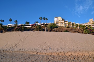 Huge sand hill on the breathtaking beach Playa del Matorral. Morro Jable, Jandia beach. Fuerteventura, Canary Islands, Spain 