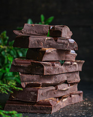 chocolate (delicious cocoa dessert, pieces of sweets) menu concept. food  background top view. copy space 