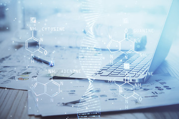 Desktop computer background and DNA drawing. Double exposure. Science concept.