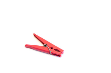 Red clothespin. On white background.