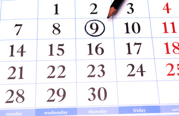 calendar with pencil for notes