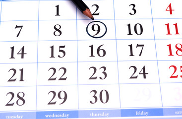calendar with a black pencil