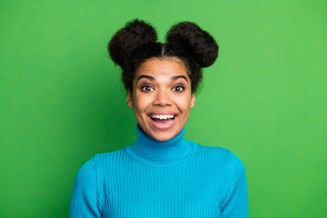 Fototapeta na wymiar Closeup photo of funny beautiful pretty dark skin lady excited good mood beaming smile crazy facial expression wear blue turtleneck sweater isolated green color background