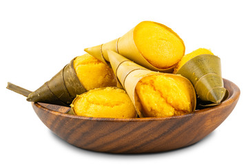 Pile of Toddy Palm Cake or Kanom Tarn, the local Thai dessert in wooden bowl on white background with clipping path.