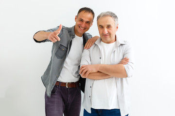 Senior Father With Adult Son isolated on white background