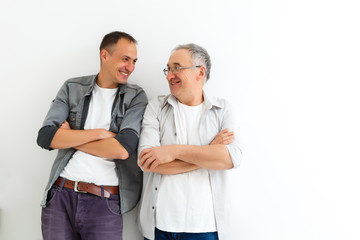 Senior Father With Adult Son isolated on white background