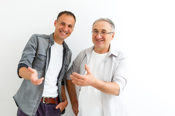 Senior Father With Adult Son isolated on white background