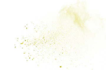 Yellow powder explosion on white background. Colored cloud. Colorful dust explode. Paint Holi.