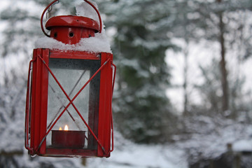 Winter lantern, snowy background