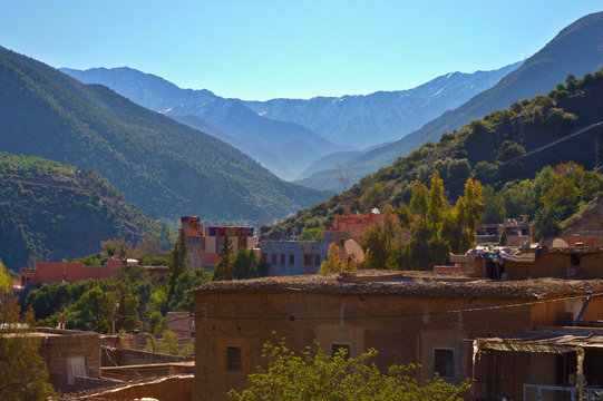 Berber villages and houses made out of clay at the hills and mountains of High Atlas 