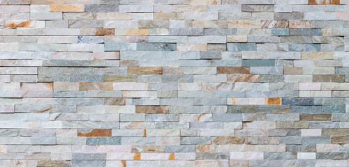 Stone wall pattern, decorative background texture. Light brown brick wall background for interior...