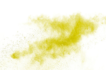 Fototapeta na wymiar Yellow powder explosion isolated on white background.