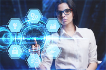 Business, Technology, Internet and network concept. Young businessman working on a virtual screen of the future and sees the inscription: Business transformation