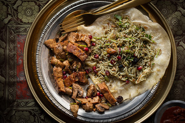 Seitan  and musrroom fry served with rice pilaf and flat bread
