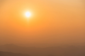 Sunset and orange sky for background.