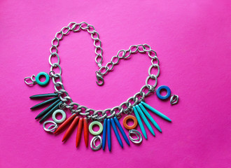 Vivid necklace on pink background