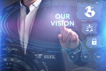 Business, Technology, Internet and network concept. Young businessman working on a virtual screen of the future and sees the inscription: Our vision