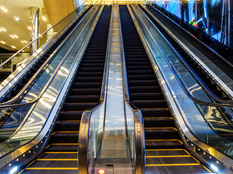 Blurred motion shot of empty escalators at Suntec City Convention and Exhibition Centre in downtown Singapore
