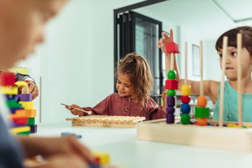 Little princess playing at kindergarten