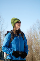 Fototapeta na wymiar Young Hiking Women Portrait With Hat And Backpack2