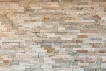 Stone wall pattern, decorative background texture. Light brown brick wall background for interior...