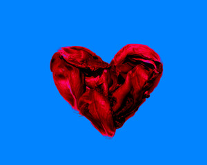 heart of the red petals isolated on blue