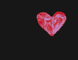 heart of the pink petals isolated on black