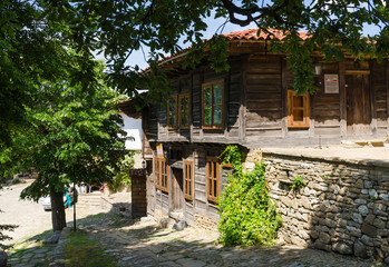 Fototapeta na wymiar Historic wooden houses from the 19th century in village of Zheravna, Bulgaria