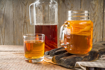 Fermented drink, Homemade sweet fermented tea Kombucha, in different jars and glasses